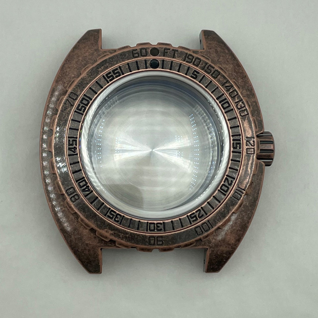 Stainless steel watch case with red effect